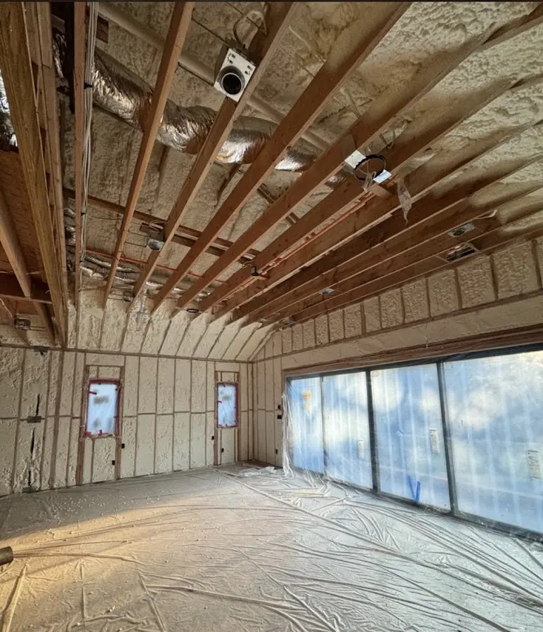 Interior walls and ceiling insulated with spray foam during new construction in Lake Wales